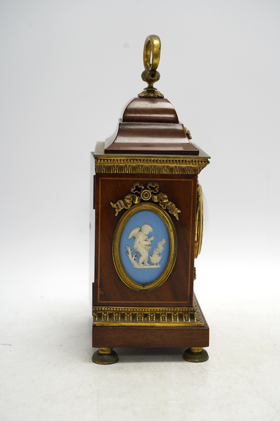 A 19th century French ormolu mounted, mahogany and box wood inlaid timepiece, by Planchon of Paris, with Wedgwood style plaques inlaid to sides, key included, 23cm. Condition - fair to good, not tested as working